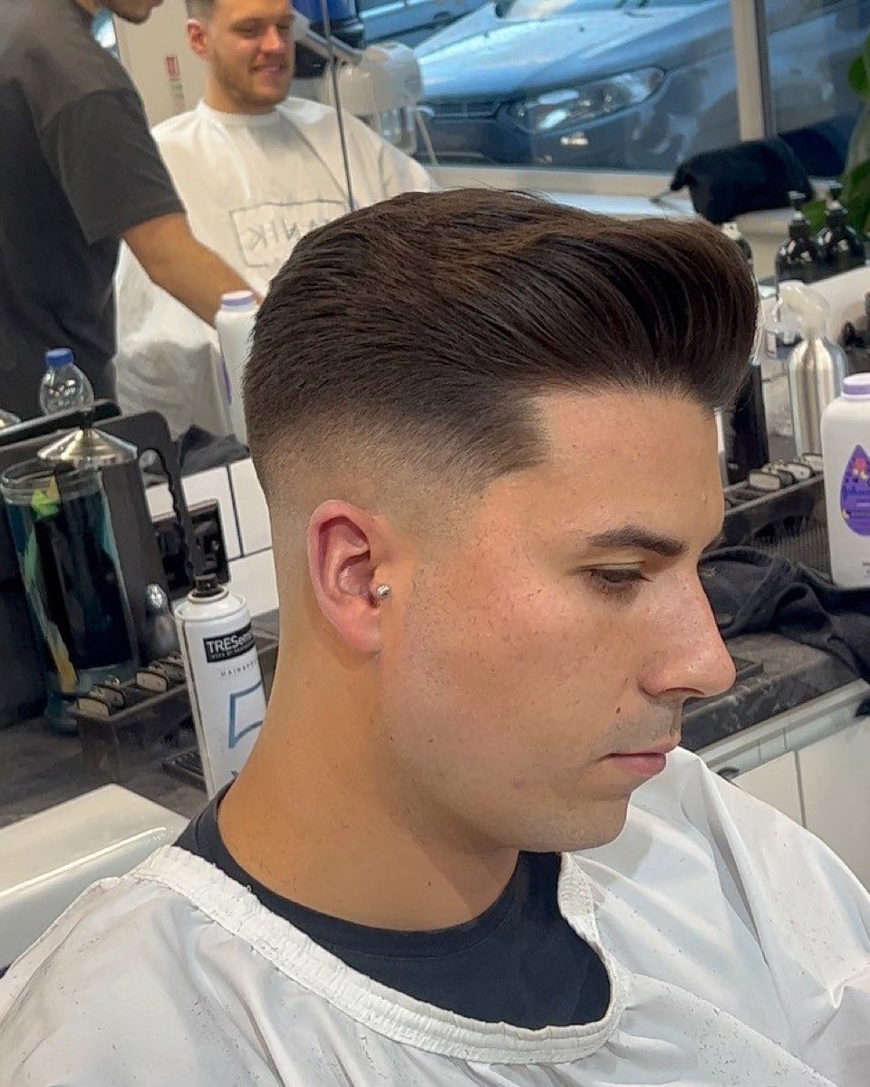 Classic side parting with a skin fade